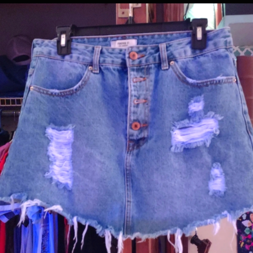 Distressed jean mini skirt